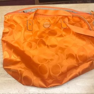 Coach tote with makeup bag